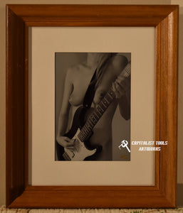 "Guitar Girl", nude blonde woman playing an electric guitar 5" x 7" B&W print in 8"x10" wood frame